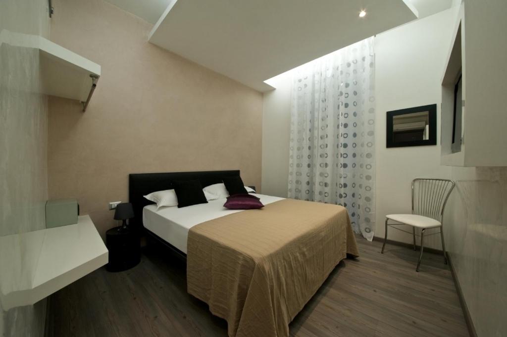 Roma Naif Rooms Pokoj fotografie